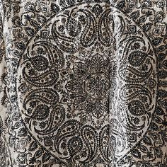 an image of a black and white pattern on fabric