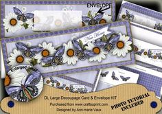 an envelope with flowers and butterflies on the inside is shown in this image, as well as two matching envelopes