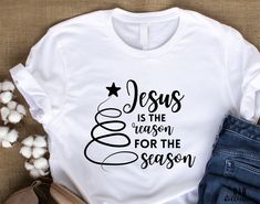 a t - shirt that says jesus is the reason for the season