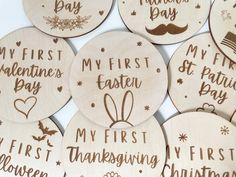 wooden coasters that say my first easter, my first thanksgiving and my first halloween