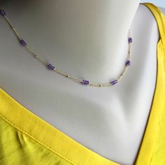 "Gemstone Necklace Amethyst Necklace Dainty Necklace Layering Necklace Simple Necklace Everyday Necklace Gold Satellite Necklace Add a bit of drama to any neckline with our classic Amethyst Choker Necklace. Beautiful Amethyst rondelles are hand wrapped in 14K Gold Filled or Sterling Silver Wire.Unlike some of our more minimalist necklaces, we have literally interspersed our Satellite Chain with Shimmering Amethyst Rondelles . The effect is nothing less than stunning . Pair with one of our longer Elegant Purple Chain Necklace For Gift, Gold Amethyst Jewelry With Delicate Chain, Elegant Purple Clavicle Chain Necklace, Purple Clavicle Chain Pendant Necklace, Purple Necklace With Adjustable Chain For Gift, Lavender Amethyst Necklaces For Jewelry Making, Elegant Amethyst Necklace With Delicate Chain, Elegant Purple Necklace With Delicate Chain, Adjustable Single Strand Amethyst Necklace