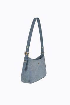 Meet Lilu, where classic chic meets everyday elegance. This bag isn't just an accessory, it's a statement. Trendy Denim Shoulder Bag For Daily Use, Casual Denim Blue Shoulder Bag For On-the-go, Elegant Shoulder Bag With Silver-tone Hardware For On-the-go, Trendy Rectangular Denim Blue Shoulder Bag, Trendy Denim Blue Hobo Shoulder Bag, Trendy Denim Blue Shoulder Bag For Daily Use, Trendy Denim Blue Satchel Bag, Trendy Denim Blue Bag With Adjustable Strap, Trendy Denim Satchel Bag