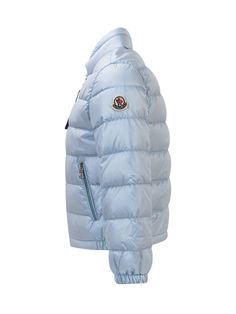 Light blue down jacket with long sleeves. High buttoned collar. Elasticized cuffs and hem. Boudin quilting. Zippered front pockets and two inside pockets. Zipper closure on front. Logo patch on sleeve.Composition: Outside: 100% Polyamide Lining: 100% Polyamide Padding: 90% Down, 10% Feather Adventure Accessories, Luxury Sportswear, Chloe Purses, Zegna Shoes, Quilt Jacket, Active Outfits, Kenzo Kids, Red Logo, Sportswear Brand