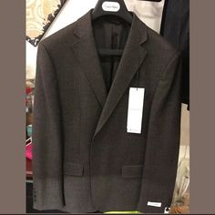 Wonderful Calvin Klein 100% Wool Sport Coat. A Classic Slim Fit With Narrow Arms. New With Tags Priced To Sell. King Of Cool Approved. Questions? Leave A Comment Below! Wool Blazer, Wool Jacket, Sport Coat, Mens Suits, Blazer Suit, To Sell, Gray Color, Calvin Klein, Slim Fit