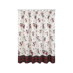 a mickey mouse shower curtain with snowflakes and santa clauss on the side