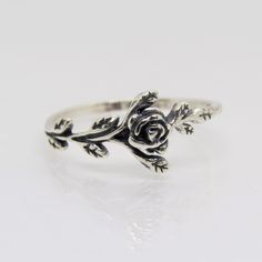 Vintage Sterling Silver Rose Flower Leaf Ring ...Marked 925...Total of weights 1.2grams...Size 7...Measure of Face 8.4MM...It's in very good condition. Adjustable Sterling Silver Flower Ring With Rose Design, Adjustable Sterling Silver Rose Design Ring, Rose Gold Sterling Silver Flower Rings, Sterling Silver Rose Gold Flower Ring, Elegant Sterling Silver Rings With Roses, Rose Sterling Silver Rings, Rose Sterling Silver Anniversary Ring, Rose Sterling Silver Promise Ring, Rose Sterling Silver Ring For Anniversary