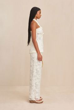 A wide leg, high-waisted pant designed in a floral organza fil-coupe fabric. —High-waist — Side zipper closure — Lined at waist — Pairs with the Lainie Top — Floral Organza Fil-Coupe Top Floral, Pants Design, High Waisted Pants, Side Zipper, Floral Tops, High Waist, Wide Leg, Off White, High Waisted