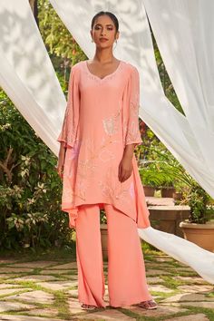 Peach tunic with sequin and cutdana embroidery. Paired with a flared pant. - Aza Fashions Peach Crepes, Cutdana Embroidery, Woven Wrap, Pant Set For Women, Tunic Pattern, Embroidered Tunic, Pant Set, Set For Women, Flare Pants