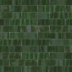 a green tile wall that looks like it is made out of glass