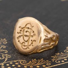 We absolutely adore wax seal signet rings - who can be mad at the junction of function and beauty? This antique number is smooth like butter with the most charming detail throughout. At face value, the stamp looks like a backwards “S” and a lowercase “g” but when you use it with actual wax, it imprints an “S” and “P.” So much charm and character with this signet, with that delicious bold gold look on the finger. 14kt yellow gold Size 6.25 and resizable Please see qualitative report for more info Smooth Like Butter, Modern Mens Rings, Art Jewelry Earrings, Pin Man, Bespoke Rings, All Band, Signet Rings, Antique Watches, Antique Engagement