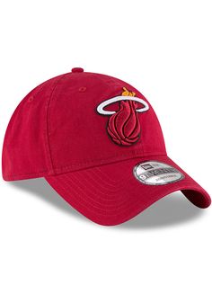 This Miami Heat Red Adjustable Hat features a front embroidered team logo on a lightly-structured cotton crown, with pre-curved visor and adjustable backstrap. Team logo embroidered on the front, Cloth Strap Closure to dial in the perfect fit, Relaxed, unstructured fit, Pre-curved bill, 100% cotton construction, New Era Flag logo on side, Dad hat, 100% Cotton, Washable, Imported Team-colored Cotton Hat With Embroidered Logo, Cotton Hat With Team Logo For Sports Events, Sports Cotton Hat With Logo, Cotton Sports Hat With Team Logo, Cotton Sports Hat With Logo, Red Baseball Cap With Embroidered Logo For Sports, Red Sports Hat With Embroidered Logo, Red Cotton Sporty Hat, Sporty Red Cotton Hat