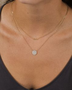 Love luxe layers? This dainty, feminine necklace will become your new fave! It features a smooth bar and a CZ-studded disk. Available in gold and silver tones and adjustable for a perfect fit. Materials: 14K gold or rhodium plated brass, cubic zirconia Features: Measures 16-18" with 2" extender, 0.4X0.1" & 0.45" pendants, Lead & Nickel free, lobster clasp Dainty Chain Necklace, Feminine Necklace, Wedding Necklaces, Necklaces Silver, Layered Necklaces Silver, Dainty Chain, Gold Necklace Layered, Layered Necklace, Wedding Necklace