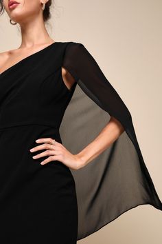 Everyone will be in awe of you when you stride in wearing the Lulus Majestic Energy Black Cape Sleeve One-Shoulder Mini Dress! This elegant little dress has a slightly stretchy, techno crepe knit composition that features a stunning one-shoulder neckline framed by a sheer long cape sleeve that continues across the back. A princess-seamed bodice sits atop a figure-skimming bodycon skirt that ends at a cute mini hem. Hidden side zipper/clasp. Fit: This garment fits true to size. Length: Mid-thigh. Chic Stretch One-sleeve Dress, Black Off-shoulder Dress With Asymmetrical Neckline, Black Cold Shoulder Off Shoulder Dress For Evening, Chic Cold Shoulder Bodycon Evening Dress, Black Cold Shoulder Party Dress, Black Off-shoulder Dress With Asymmetrical Neckline For Evening, Black Cold Shoulder Dress For Night Out, One Sleeve Stretch Mini Dress For Evening, Black Stretch One Shoulder Dress With Asymmetrical Neckline