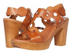 Eric Michael Sienna - Women's Shoes : Tan : The Eric Michael Sierra heeled sandal is perfect for a day out and about. The strappy leather upper boasts scalloped edges and large perforations while the hook-and-loop closure lends a secure fit. Leather lining and footbed. Tapered heel. Man-made outsole. Made in Spain. Measurements: Heel Height: 3 in Weight: 8 oz Platform Height: 1 in Product measurements were taken using size 38 (US Women's 7.5-8), width M (B). Please note that measurements may var Low Heel Leather Footbed Heels For Spring, Spring Low Heel Shoes With Leather Footbed, Spring Block Heel Sandals With Leather Footbed, Spring Leather Footbed Open Toe Heels, Spring Block Heel With Leather Footbed, Spring Block Heel Heels With Leather Footbed, Spring Open Toe Heels With Leather Footbed, Spring Leather Block Heel Shoes, Heeled Sandal