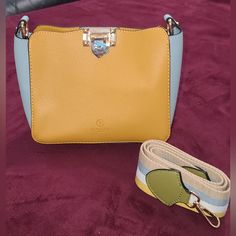 No Brand Leather Bag With A Strap Ht 6 1/4 In Width 7 1/4 In Depth 3 In Yellow Bucket Shoulder Bag With Detachable Handle, Trendy Yellow Bucket Bag With Detachable Strap, Yellow Bucket Bag With Detachable Handle, Yellow Top Handle Satchel With Mobile Phone Bag, Yellow Bucket Bag With Detachable Handle For Daily Use, Yellow Shoulder Bag With Gold-tone Hardware And Top Handle, Yellow Top Handle Shoulder Bag With Gold-tone Hardware, Yellow Shoulder Bag With Top Handle And Gold-tone Hardware, Chic Yellow Satchel With Mobile Phone Bag