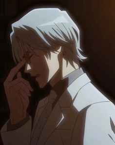 an anime character is talking on his cell phone while wearing a suit and tie,