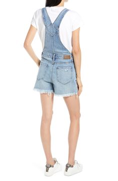 Roughed-up patches add cool texture to these medium-wash short overalls styled with adjustable straps and frayed hems. Style Name:Hidden Jeans Frayed Hem Short Overalls. Style Number: 6170677. Trendy Frayed Hem Shortalls, Spring Medium Wash Shortalls With Frayed Hem, Trendy Shortalls With Frayed Hem, Medium Wash Denim Shortalls, Casual Medium Wash Distressed Shortalls, Casual Denim Cutoff Shortalls, Medium Wash Distressed Shortalls, High Rise Medium Wash Shortalls For Summer, Dark Wash Denim Shortalls