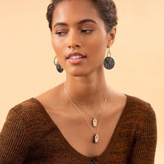 Our inspirational HOPE pendant is designed to uplift and inspire. Hand carved horn is engraved with the word Hope and gently swings behind a delicately scalloped metal pendant. Wear it as a beautiful reminder to live life with a spirit of optimism and share it as the perfect gift to brighten someone’s day. Don't forget the perfect complement to your inspirational necklace, the pearl and glass HOPE bracelet 16" Length 3" Adjustable Extender 10k Gold Tone Plated Brass, Swarovski Crystal & Horn Crystal Horn, Hope Bracelet, Metal Pendant, Gold Hoops, Gold Hoop Earrings, Chain Pendants, 10k Gold, Uganda, Live Life