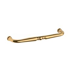 a gold colored metal handle for a door