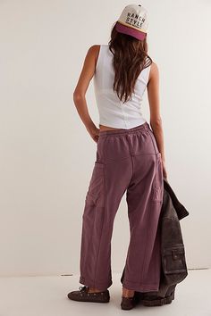 Elevate every look with these effortlessly essential pants featured in a slouchy, relaxed fit and soft fabrication with straight legs, logo-adorned drawstring waist, and defined pockets at sides for a utility-inspired touch. **Fit:** Relaxed, slouchy fit **Features:** Elasticated waistband, logo-adorned drawstring, striped side pockets, straight legs, defined seaming throughout **Why We ❤ It:** The perfect pair to style with anything from a comfy ‘fit to a more put-together top, these timeless p Utility Style Drawstring Sweatpants For Loungewear, Utility Drawstring Sweatpants For Loungewear, Utility Sweatpants With Drawstring For Loungewear, Wide-leg Parachute Pants With Cargo Pockets For Loungewear, Loungewear Straight Leg Sweatpants With Hip Pockets, Utility Drawstring Pants For Loungewear, Everyday Wide Leg Joggers With Pockets, Utility Style Drawstring Pants For Loungewear, Everyday Athleisure Bottoms With Cargo Pockets