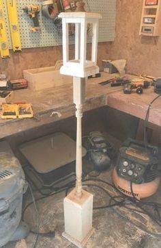 a workbench with tools and equipment on the counter in front of it,