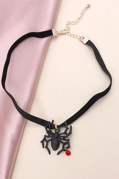 How fun is this spider for Halloween velvet choker necklace. This will be perfect on your Halloween costume.matching earring: 10E3060167DIMENSIONlength: 12"ext: 3" Ball Chain Extclasp: Lobster Clawmetal finish: Gold Platedproduct: Lead & Nickel Compliantanti-tarnish: Double E-coating Punk Jewelry For Halloween Costume Party, Black Choker For Halloween Gift, Black Punk Jewelry For Halloween, Black Punk Jewelry For Costume Party, Halloween Novelty Jewelry For Cosplay, Black Halloween Costume Jewelry, Halloween Cosplay Novelty Jewelry, Themed Black Metal Jewelry, Black Spooky Jewelry For Costume Party