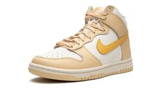 The Women’s Nike Dunk High “Pale Vanilla” is a women’s-exclusive colorway of the popular retro basketball and lifestyle shoe with a spring and summer vibe.  The “Pale Vanilla” features a white leather base with Pale Vanilla leather overlay panels.  A Topaz Gold leather Swoosh can be found on both sides of the shoe.  The orange-gold hue also appears on the “Nike” and Swoosh branding on the tongue tag.  Underfoot, a white midsole and Pale Vanilla rubber outsole put the finishing touches on this Du Dunks High, Sneaker Displays, Sneakers Box, Kobe Shoes, Retro Basketball, Nike Gold, Nike Dunk High, Dunk High, Sneaker Release