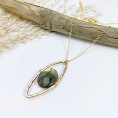 Our pod necklace features a large oval cut of flashing labradorite which is surrounded by a heavy gold, hand forged, marquis shaped pendant. This stunning piece drops from a fine textured gold filled chain. •14k gold filled •Labradorite •Pendant Dimensions: about 1.5 x .5" •Length 17" available with or without 3" extender chain Beach Jewelry Boho, Gold Hand, Handmade Jewelry Designs, Trendy Necklaces, Brass Necklace, Labradorite Pendant, Gold Texture, Gold Filled Chain, Jewelry Tutorials