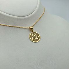 Dazzle with our exquisite 14K Solid Gold Trinity Knot Necklace, a stunning blend of Celtic heritage and minimalist elegance. Handcrafted to perfection, this intricate Triquetra design embodies Norse mystique and timeless beauty. An ideal birthday gift, our Tiny Viking Necklace exudes charm and sophistication, making it a cherished addition to any jewelry collection. ⚜️ Package included: One Handmade Necklace ⚜️ Pendant Sizes: 14 / 16 / 18 / 20 / 22 / 24 / 26 / 28 / 30 mm ⚜️ Necklace Length: 14 / Triquetra Design, Norse Necklace, Triquetra Necklace, Celtic Triquetra, Spiritual Necklace, Dream Bracelet, Celtic Heritage, Viking Necklace, Trinity Knot