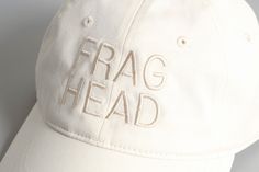 DESCRIPTION  Calling all FRAG HEADS! With a cream-on-cream colorway, embroidered declaration of fragrance fandom, and perfect dad hat fit, it’s easy to see why The Cap has been a summertime staple for us. It's crafted from lightweight 100% cotton for comfort and includes an adjustable fastener with a metal clasp and tonal under-peak lining for a perfect fit. DETAILS & CARE Low profile six panel cap, curved peak. Lightweight 100% cotton. Adjustable fastener with metal clasp. One size fits all. Beige Cotton Snapback Dad Hat, Trendy Cream Cotton Hat, Embroidered Cotton Dad Hat For Summer, Trendy Beige Dad Hat For Summer, Summer Embroidered Cotton Dad Hat, Everyday Cream Cotton Hat, Spring Snapback Dad Hat In Cotton, Spring Cotton Snapback Dad Hat, Cream Cotton Dad Hat With Curved Visor