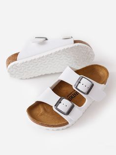 DESCRIPTION:Double-buckle sandal made from durable skin-friendly Birko-Flor® material.FEATURES:Round ToeAdjustable Double-Buckle ClosureUpper: Synthetic Birko-Flor®Anatomically Shaped Cork & Latex FootbedFootbed Lining: SuedeSole: EVARegular Fit White Synthetic Sandals With Adjustable Strap, White Adjustable Strap Synthetic Sandals, Casual White Sandals With Adjustable Strap, White Sandals With Adjustable Strap, Comfortable White Sandals With Adjustable Strap, White Slides With Cork-bed Midsoles For Spring, White Double Strap Footbed Sandals For Beach, White Open Toe Footbed Sandals With Adjustable Strap, White Closed Toe Sandals With Adjustable Strap