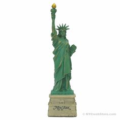 the statue of liberty is holding a torch