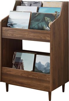 a wooden magazine rack with pictures on it