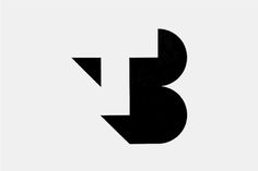 the letter b is made up of black and white letters, with an arrow in the middle