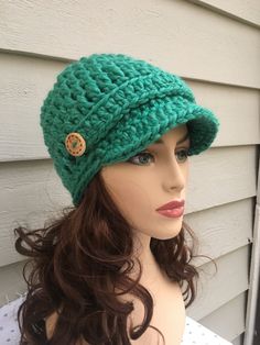 Handcrafted in super soft, chunky and wool-blended yarn, it's designed to cover your ears and sit low on forehead.  Fashioned with natural wood buttons, you'll be fab and fashionable even on bad hair days :) When I tried the hat for sizing, I seriously didn't want to take it off - super comfortable and warm! Ready to ship in teen/adult small/medium. Made with great care in my 100% smoke free home studio.  Because of the high wool count, hat can be hand washed in lukewarm water or air dried. Please do not place in dryer. Please note: to save on my customer's shipping costs, this item will be shipped via bubble mailer. Hat pattern from Simply Made by Erin here on Etsy! Crochet Brimmed Hat, Green Crochet Hat, Chunky Crochet Hat, Crochet Hat With Brim, Crochet Hat For Women, Chunky Hat, Womens Hat, Green Crochet, Newsboy Hat