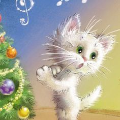 a white kitten standing next to a christmas tree