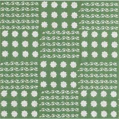 a green and white pattern on fabric