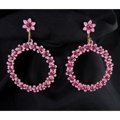 Such cheer is to be found in these 1960's clip on hoop earrings made of bright pink enameled metal flowers with pink rhinestone centers! Each earring is just under 2" high and 1 7/16" wide. The backs are gold-plated as are the clip tops. Condition is unworn and excellent! Flower Power reigns again! Please use the "View Shop Policies" link on the lower right of each item page for important information before you order. Clip On Hoop Earrings, Antique Costume Jewelry, Pink Enamel, Metal Flowers, Pink Rhinestones, Clip Earrings, The View, Shop Policies, Vintage Earrings