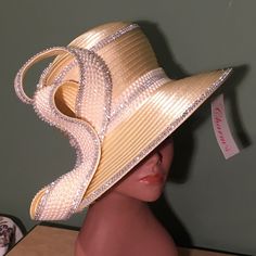 Dazzling ! This Is The Kind Of Buttercream Yellow Hat That Will Command Attention When You Enter The Room. It Has Gleaming Sparkling Rhinestones & Pearls On It. 22.5”-22.75” Inside Measure With Drawstring For Fit. Final Sale! Elegant Rhinestone Hat For Spring, Evening Hats With Rhinestones And Curved Brim, Elegant Wide Brim Hat With Rhinestones, Formal Rhinestone Hats For Kentucky Derby, Elegant Summer Hats With Rhinestones, Spring Party Hats With Rhinestones, Evening Wide Brim Hat With Rhinestones, Elegant Evening Hats With Rhinestones, Designer Curved Brim Hats For Parties