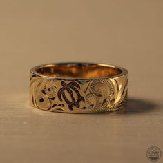 ring from Hawaii Yellow Gold Symbolic Carved Jewelry, Carved Symbolic Yellow Gold Jewelry, Traditional Carved Yellow Gold Rings, Unique Yellow Gold Engraved Ring, Traditional Yellow Gold Engraved Ring, Ceremonial Yellow Gold Engraved Symbolic Ring, Symbolic Etched Yellow Gold Rings, Unique Engraved Yellow Gold Ring, Traditional Etched Yellow Gold Engraved Ring