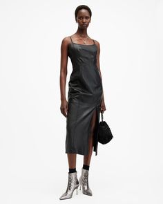 Feel great in leather with the Norlene Dress, it's structured to a fitted shape through the body. The silhouette features a scoop neckline, seamed bodice and open side split. Pair with a tee for amped up day-to-day dressing or team it with a heel for evening drinks and you're good to go...  This dress is designed to a bodycon fit Zip closure Sleeveless Midi length Scoop neck Seamed bodice Open side split Fully lined with stretch fabric Leather Midi Dress, Fall Outfits Men, Side Split, Womens Midi Dresses, Black Midi Dress, All Saints, Denim Shop, Scoop Neckline, Midi Length