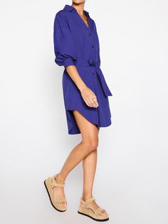 Kate belted button up mini shirtdress blue full view Blue Belted Button-up Shirt Dress, Blue Belted Button-up Dress, Belted Long Sleeve Shirt Dress For Brunch, Chic Belted Button-up Dress With Tie Waist, Collared Belted Shirt Dress For Date Night, Belted Collared Shirt Dress For Date Night, Date Night Belted Collared Shirt Dress, Belted Midi Shirt Dress For Brunch, Chic Blue Shirt Dress With Button Cuffs