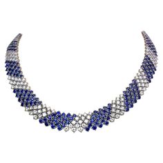 This lovely designed collar necklace by Crivelli is entirely set with 5 rows of round brilliant Diamonds and Blue Sapphires. The alternating stones and the flexibility of the setting will lay beautifully around the neck. The necklace measures 16" long. Diamond weight = 13.16 carats Blue Sapphires weight = 27.21 carats Stamped 750 18K Sapphire Diamond Necklace, Blue Sapphire Jewelry, Diamond Pendants Designs, Blue Sapphire Necklace, Big Necklace, Diamond Necklace Designs, Starry Nights, Antique Jewelry Indian, Jewelry Brands