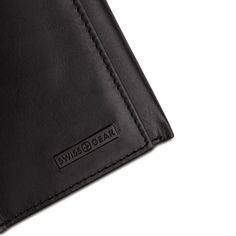 Tired of your old stretched out wallet? Using rubber bands to hold your cards and cash together? It’s time for a wallet that carries more in less space and looks great with everything. The Swissgear Trifold Wallet in black Napa leather gives you the convenience of a lightweight, compact size wallet when folded with plenty of capacity for everything you need. The inside of this small but mighty wallet is finished with four card slots, two slip pockets, one identification window and a large, lined Modern Black Trifold Wallet For Everyday Use, Modern Black Trifold Wallet, Black Bifold Card Holder, Black Rfid Blocking Wallet For Business, Modern Black Leather Trifold Wallet, Black Bifold Card Holder For Business, Black Functional Wallet For Everyday Use, Functional Black Leather Wallet, Functional Black Wallet For Daily Use