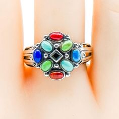 Vintage Sterling Silver Multi-Stone Ring Size 9.25. This Sterling Silver cluster ring features a variety of gemstones including turquoise, gaspeite, spiny oyster, coral, lapis, and onyx. Ring is pre-owned and in great condition. Buy with confidence knowing that all precious metals are tested and are guaranteed with the Thermo Scientific Niton DXL Xray Scanner. All gemstones are authenticated using the Presidium Gem Tester II. Jewelry items come in a black velvet jewelry pouch or gift box and are Velvet Jewelry, Spiny Oyster, Onyx Ring, Multi Stone Ring, Multi Stone, Gold Charm, Cluster Ring, Jewelry Pouch, Stone Ring