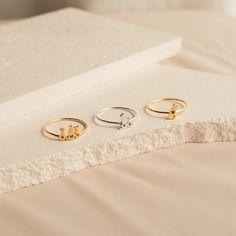 • Material: High-Quality Solid 925 Sterling Silver• Finish: Sterling Silver ∙ 18K Gold ∙ Rose Gold • Dimensions: 4mm Charm Height | 1mm band SKU: MM-RM47F77 Anniversary Sterling Silver Tarnish-resistant Midi Rings, Modern Tarnish Resistant Midi Rings For Anniversary, Modern Tarnish-resistant Midi Ring For Anniversary, Minimalist Sterling Silver Initial Ring With Birthstone, Modern Stackable Initial Ring For Anniversary, Adjustable Tarnish Resistant Stackable Rings For Anniversary, Gold Sterling Silver Midi Rings For Anniversary, Modern Hallmarked Stackable Rings As Gift, Minimalist Adjustable Hallmarked Stackable Rings