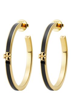 A signature double-T ornament charms the curves of these enamel-trimmed hoops that add a subtle splash of elegance to your lobes. Post back 1 5/8" hoop diameter 18k-gold plate/enamel/crystal Imported Luxury Black Hoop Jewelry, Elegant Enamel Hoop Earrings, Elegant Enamel Hoop Jewelry, Small Elegant Enamel Hoop Earrings, Gold Hoop Earrings With Black Enamel For Gift, Black Enamel Hoop Earrings, Elegant Black Enamel Hoop Earrings, Elegant Black Enamel Hoop Earrings Gift, Elegant Gold Hoop Earrings With Black Enamel