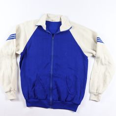 Vintage 70s Soffe Full Zip Soccer Warm Up Jacket Jacket New Without Tags There Is Some Staining On The Left Sleeve Blue And White Mens Large Measurements Are: 21 Inches From Underarm To Underarm 27 Inches From Top To Bottom Creslan Acrylic Check Out My Other Items In My Store Vogue Squared! Big Bin Blue Vintage Cotton Varsity Jacket, Vintage Blue Track Jacket With Pockets, Retro Blue Track Jacket With Pockets, Vintage Blue Track Jacket For Winter, Vintage Blue Long Sleeve Track Jacket, Retro Blue Cotton Track Jacket, Soccer Warm Ups, Vintage 70s, Blue Gray