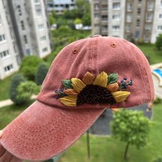 🌼🌼 All the flowers on the hat have been hand-embroidered, and each design is unique. These hats will shield you from the summer sun's heat and serve as the perfect complement to your outfits. ------------------------------------------------------------- Color: Orange Design: hand embroidered with wildlowers Cap size (head circumference): 55 - 67 cm; Fabric: 100% cotton - Cotton threads This hat comes in a one-size-fits-all design with an adjustable back. You have the flexibility to customize t Custom Embroidery Summer Baseball Cap, Summer Snapback Hats With Custom Embroidery, Custom Embroidered Summer Baseball Cap, Custom Embroidered Baseball Cap For Summer, Custom Embroidered Summer Hats With Adjustable Fit, Summer Snapback Baseball Cap With Custom Embroidery, Embroidered Summer Dad Hat, Embroidered Dad Hat For Summer, Embroidered Dad Cap For Summer