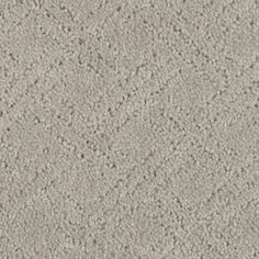 a gray carpet textured with small dots